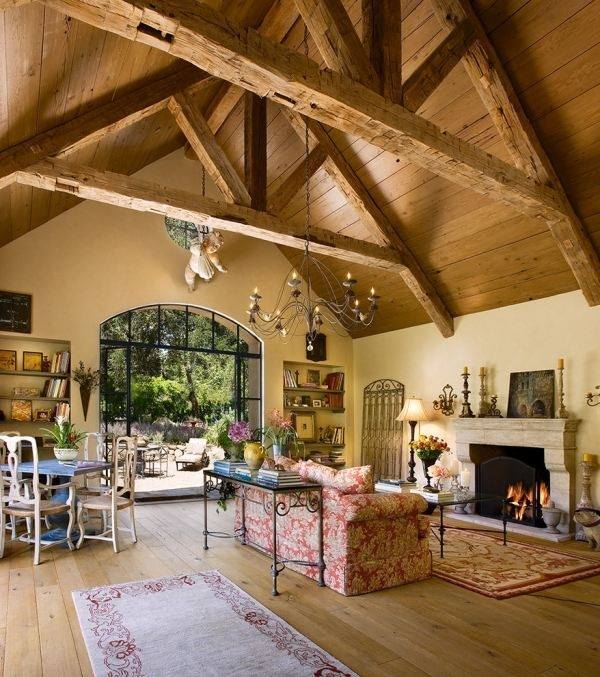 Tuscan decor exposed beams wrought iron decorative elements