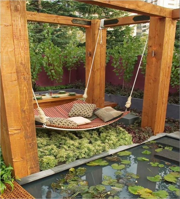 awesome backyard escape idea swing bed wood pillars garden pond