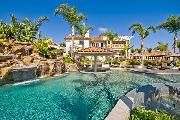 backyard oasis ideas amazing swimming pool waterfall palm trees