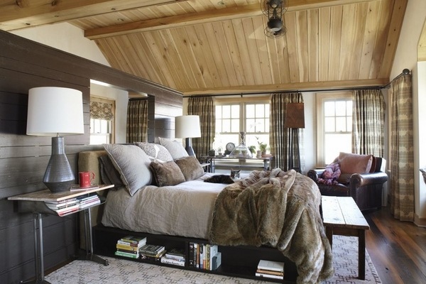 farmhouse style bedroom design wood floor brown colors leather armchair