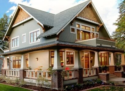 farmhouse-design-wrap-around-porch-pillars-railings