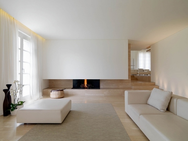 minimalist interiors white walls white furniture beige rug