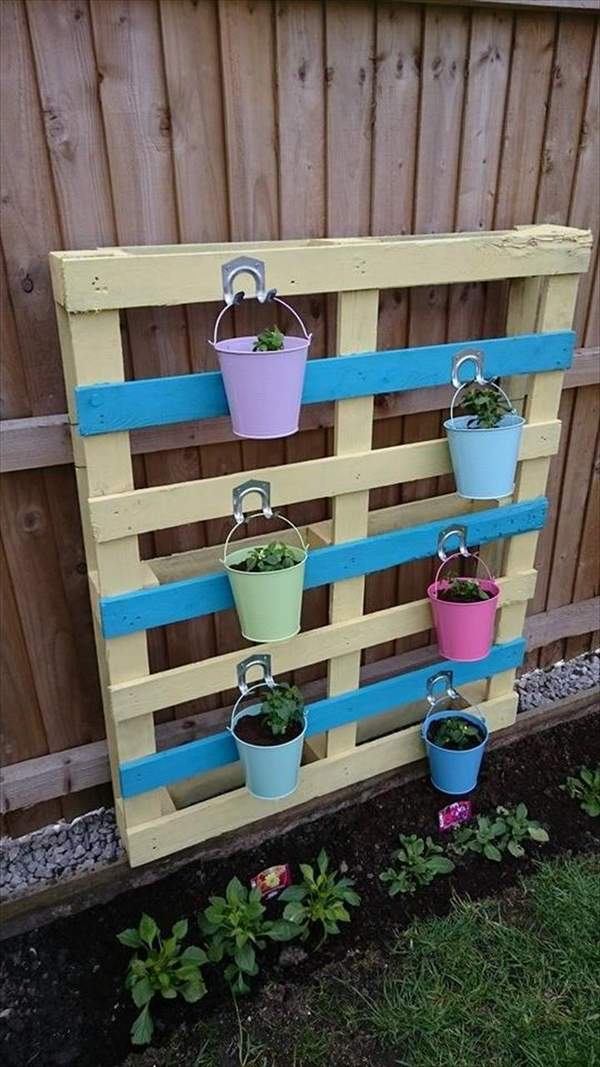 pallet herb planter colorful buckets fence