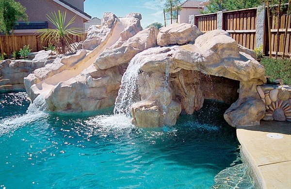 rock waterfall pool with slide pool water features patio landscape 