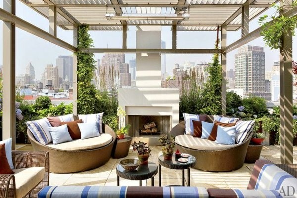rooftop design ideas pergola creepers rattan furniture fireplace