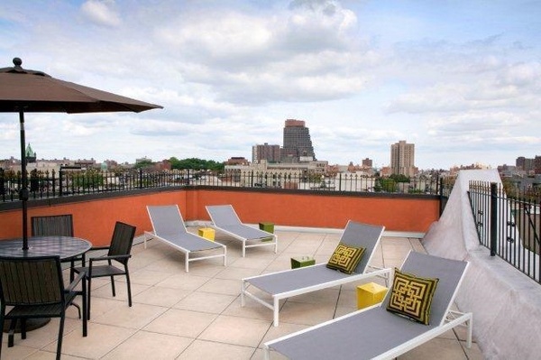 rooftop design ideas sunbeds outdoor furniture parasol
