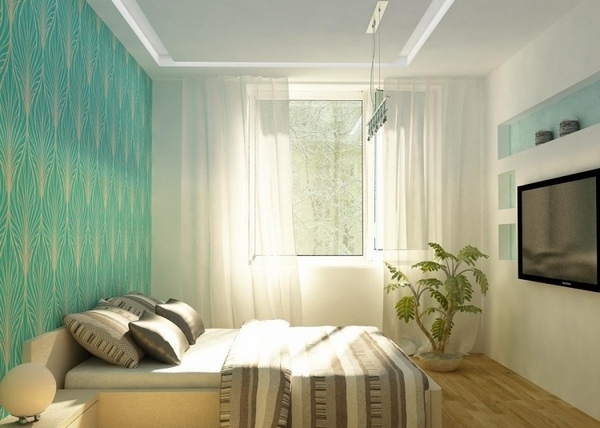 small-bedrooms-ideas-wall mounted tv turquoise wall