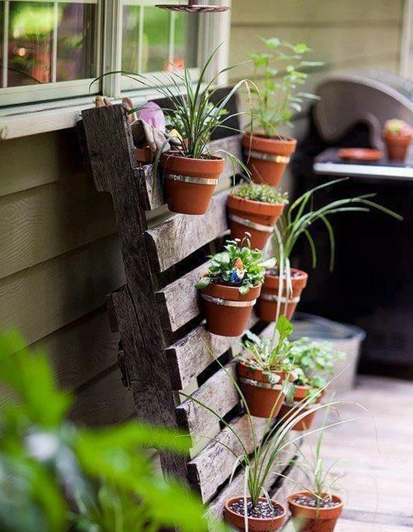 space saving vertical garden clay pots herb pallet