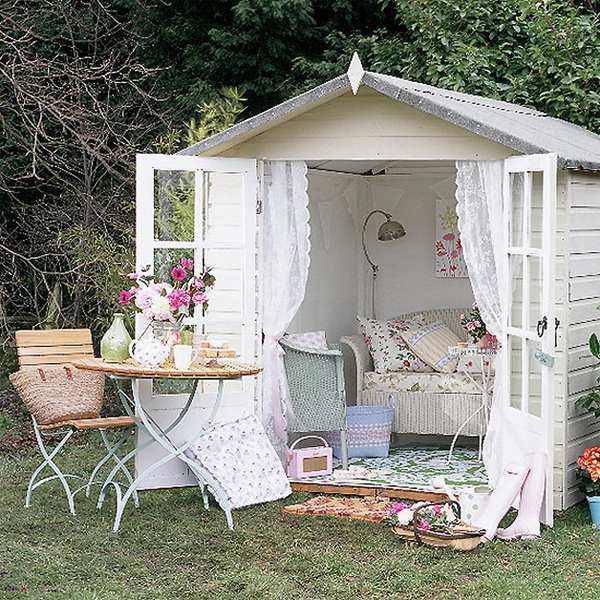 vintage style garden shed backyard escape ideas armchair round table