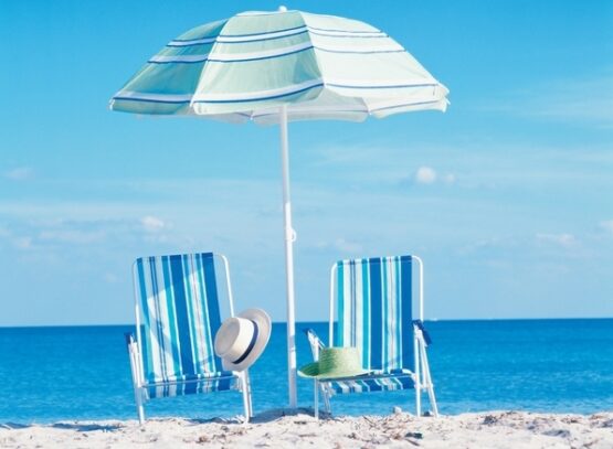 Folding-beach-chairs-blue-white-striped-fabric-small-beach-umbrella