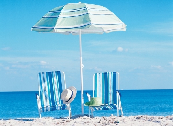 Folding beach chairs blue white striped fabric small beach umbrella
