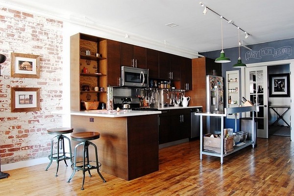 Industrial kitchen design wood cabinets and island brick wall 