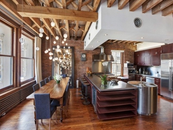 Kitchen design industrial decor stainless steel countertop wood floor ceiling beams