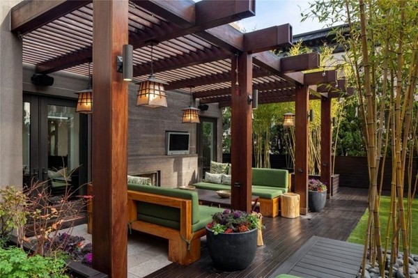 backyard design wooden pergola green upholstery bamboo trees