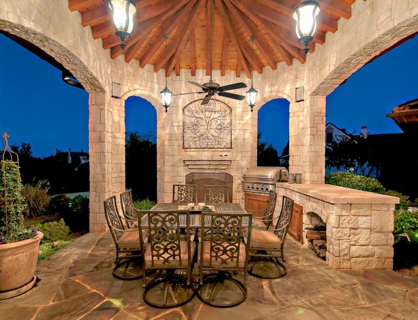 backyard patios ideas Mediterranean style iron furniture