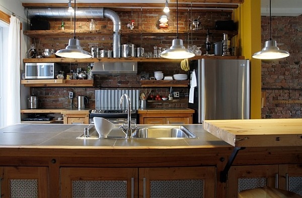 brick wall steel surfaces pipes open shelves industrial kitchen