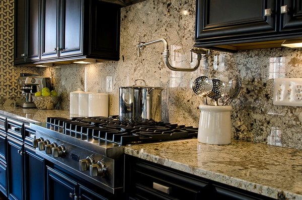  kitchen-ideas-black-cabinets-granite-slab-backsplash