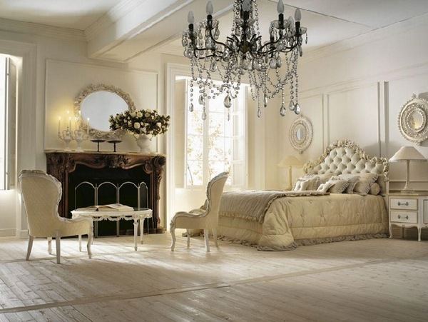 glamorous bedroom ideas large chandelier tufted headboard fireplace 