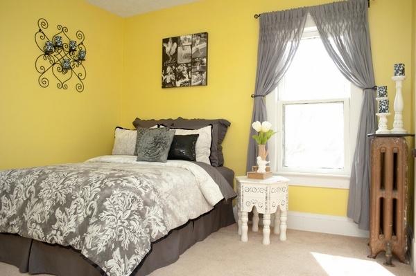 yellow wall color gray curtains bedding