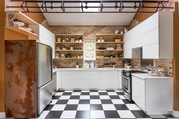 industrial kitchen design white cabinets brick wall faux bricks checkered floor tiles