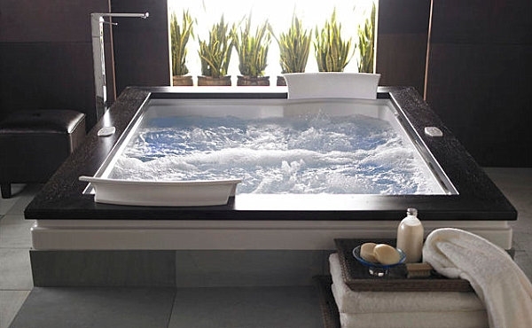 modern large whirlpool tub with headrests wooden border
