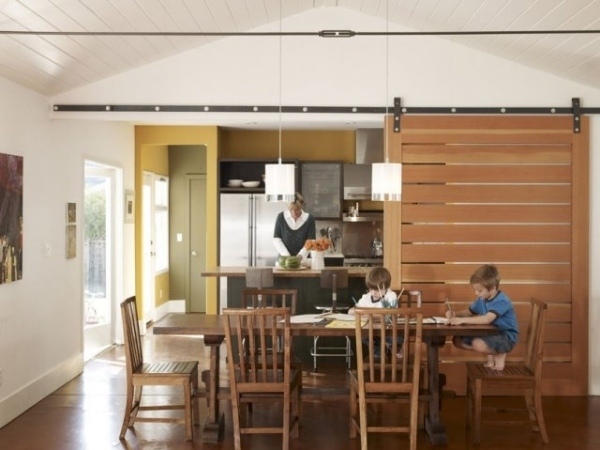 open floor plan kitchen dining room barn doors 