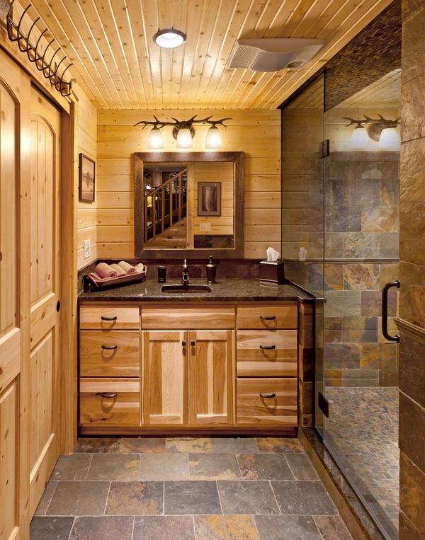rustic bathroom walk in shower floor tiles wood vanity  ceiling