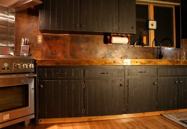 rustic black cabinets wood flooring