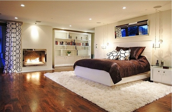 stylish basement bedroom ideas fireplace wood flooring 