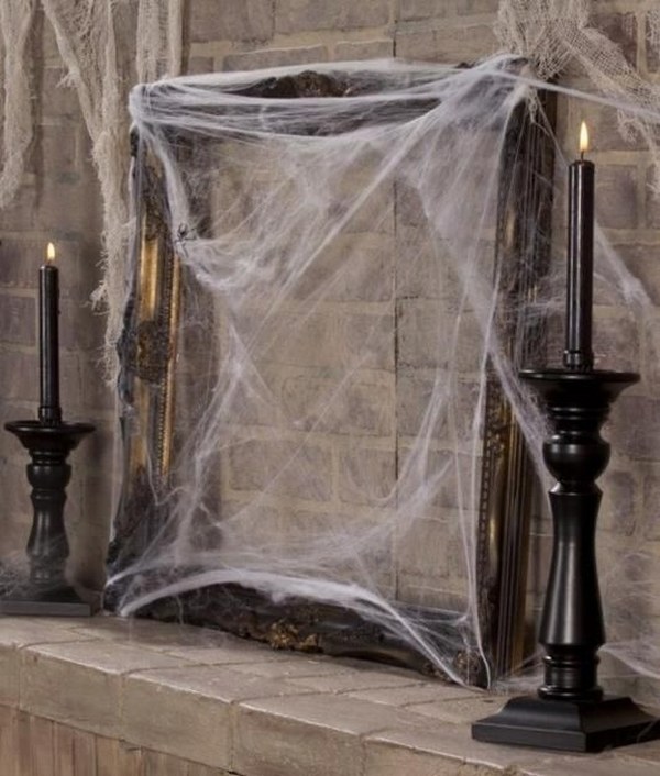 vintage-halloween-decorations-old picture frame spider web black candelabras