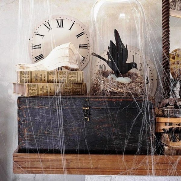 vintage-halloween-decorations-wooden box books clock spider web