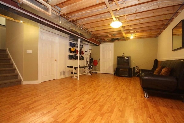 what is best basement wood floor pros cons