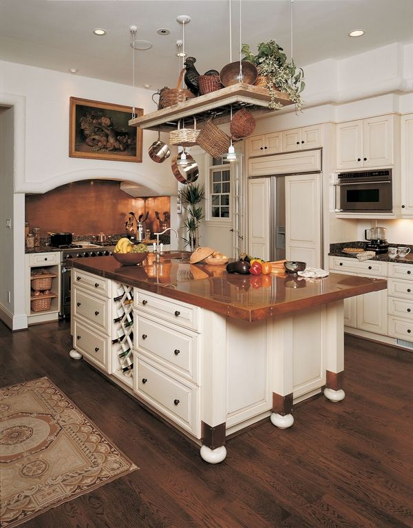 white kitchen cabinets copper backsplash country style
