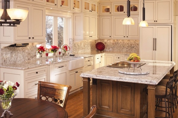 white-kitchen-granite-countertops-and-backsplash-wood-kitchen-island-with-seating