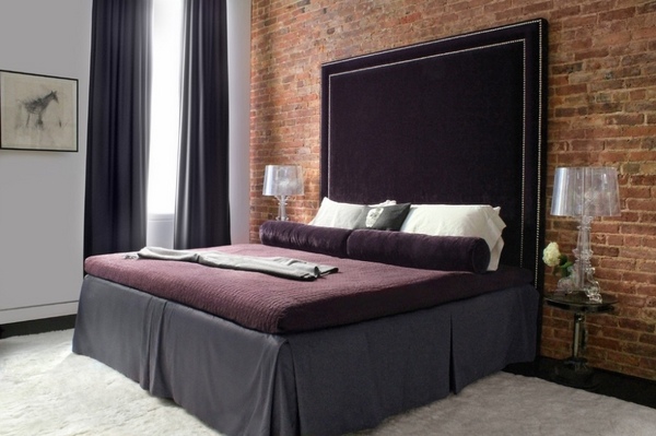 Black-tall-headboard-ideas-bedroom-design-ideas-exposed-brick wall round side tables
