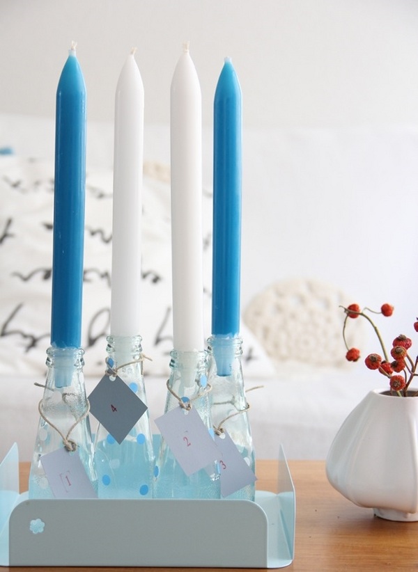  blue and white candles glass bottles