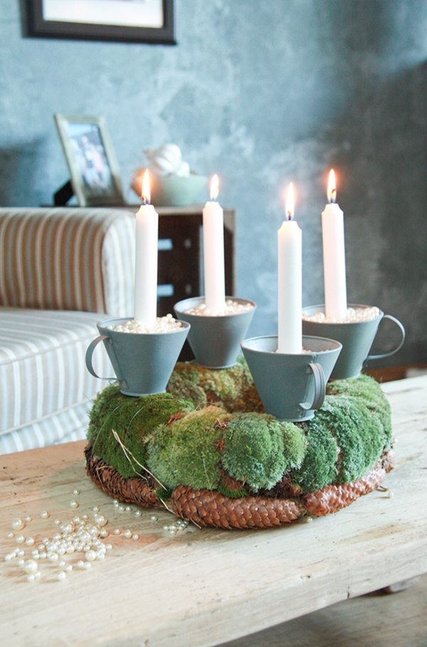 DIY advent candles ideas moss and candles pine cones rustic Christmas decoration
