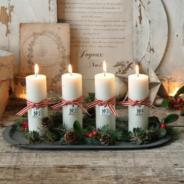 advent light ideas advent candles white pillar candles pine cones tray