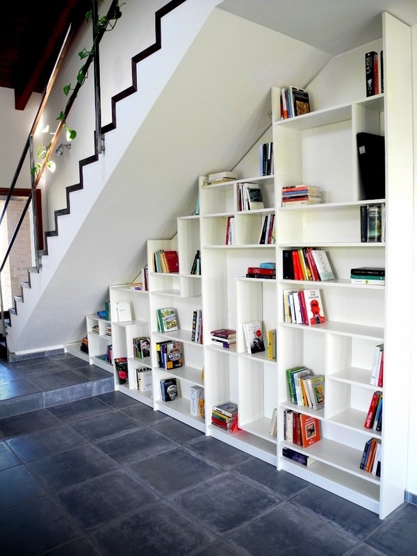amazing-under-stairs-storage-ideas-white bookshelves 
