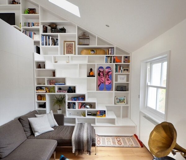 foxy-white-loft-storage-staircase-with-gray-sofa-and-shelf-under-stairs-unique-and-creative-stair-design-that-feature-space-saving-ideas-space-saving