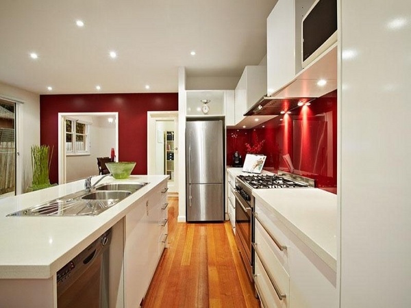 galley ideas contemporary white cabinets countertops red accent wall