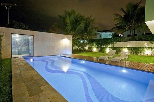 garden pool deck concrete slabs sunbeds lawn pool lighting