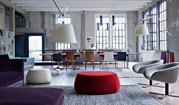 grey living room ideas concrete walls lounge armchair red white ottoman modern floor lamp