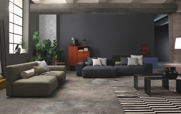  accent wall dark gray shade sofa stiped area rug