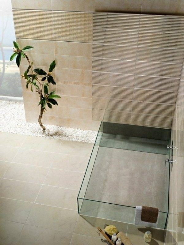 modern bathroom Zen atmosphere glass bathtub sand color wall tiles 