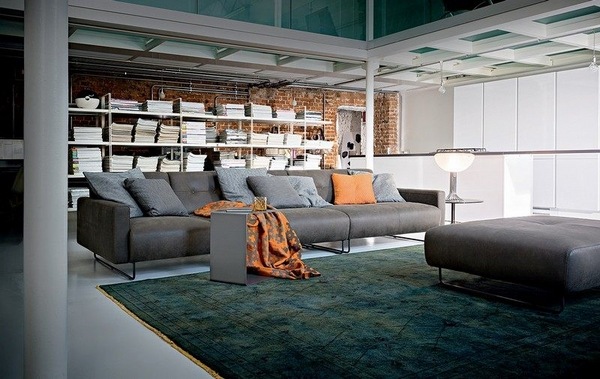 modern leather sofa green carpet white kitchen cabinets 
