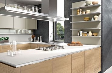 modern-kitchen-with-oak-finishes-white-countertops-gray-wall-color