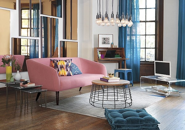 pink sofa blue curtains floor cushion