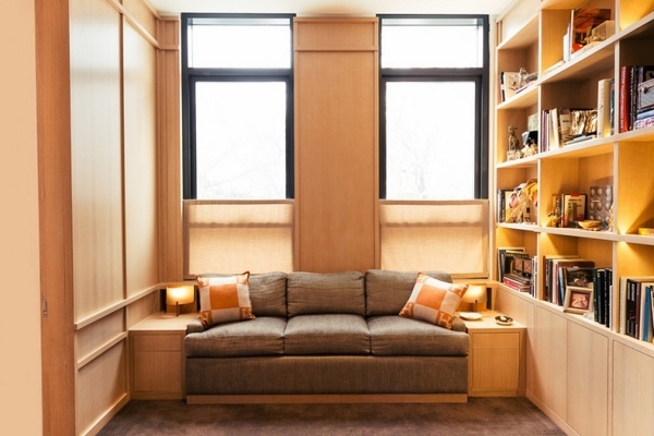 interior design sofa wall bookshelves light colors