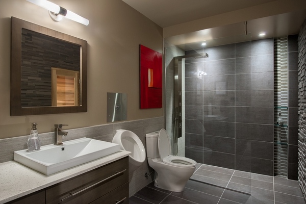 stylish basement bathroom ideas modern gray tiles wooden vanity framed mirror
